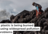 Workers prepare to burn imported plastic waste at a dump in East Java, Indonesia, in 2018. Ulet Ifansasti/Getty Images